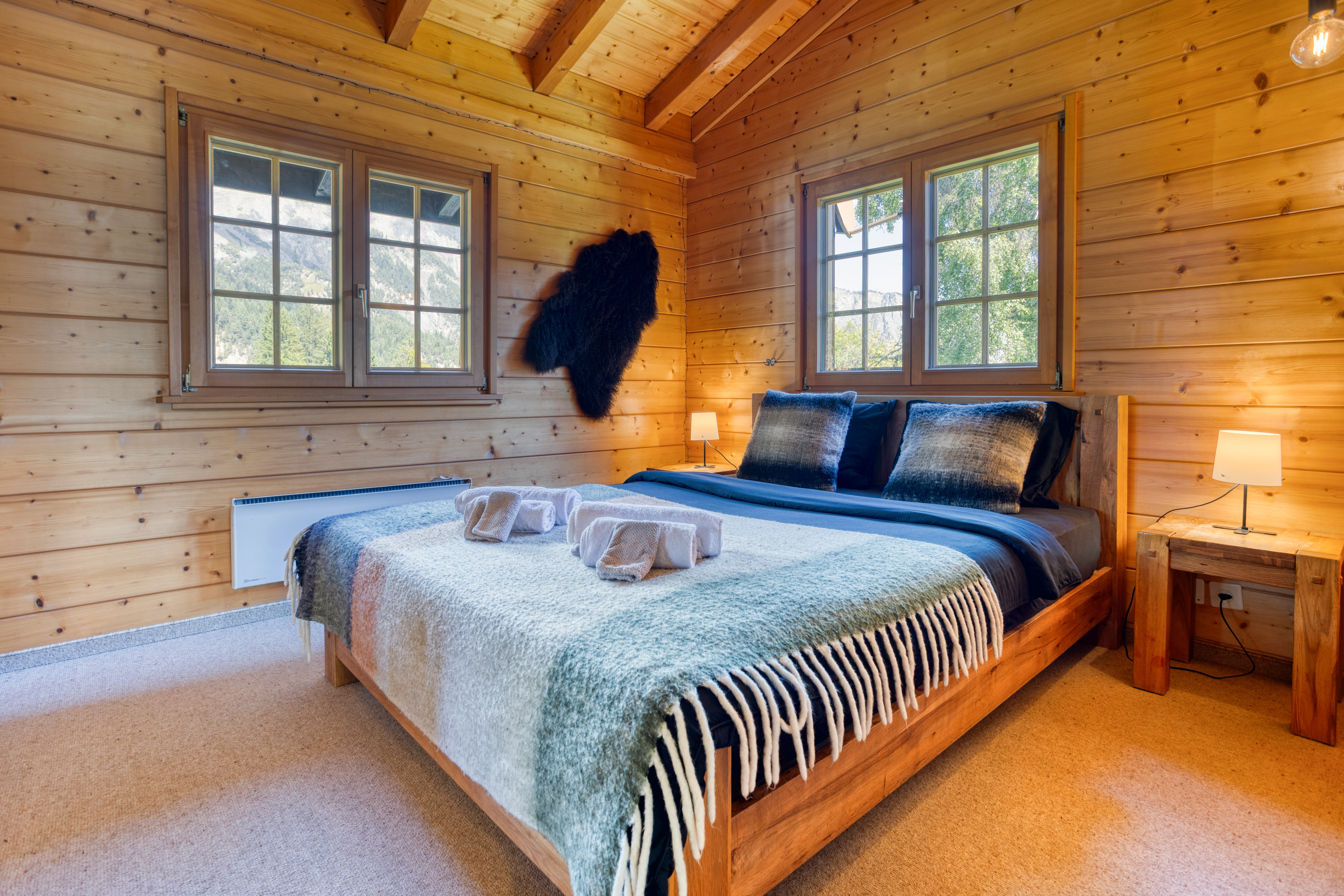 Chambre spacieuse, lumineuse et élégante du chalet Mon Rêve